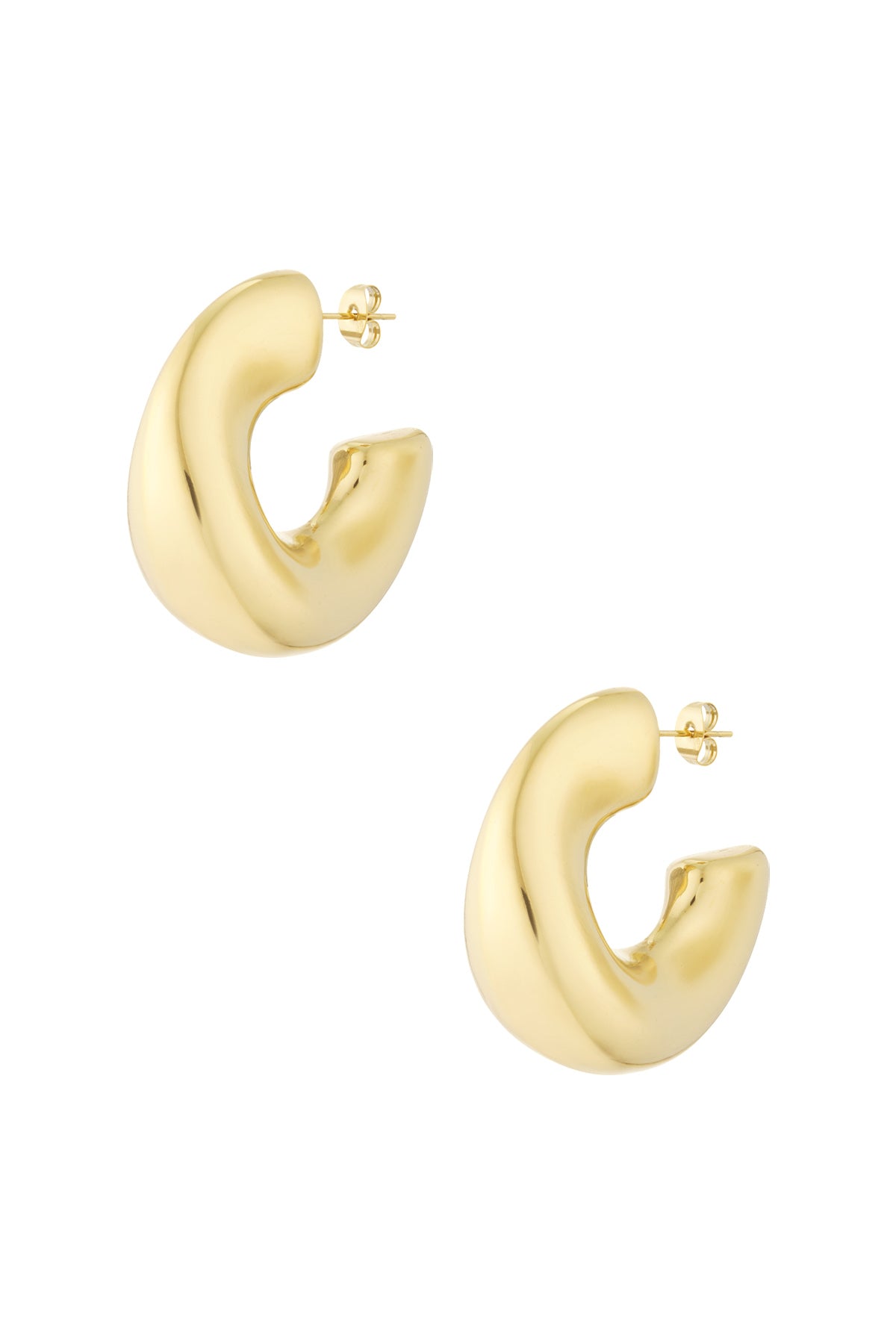Pair of chunky sculpted hoop earrings in polished gold finish isolated on white background