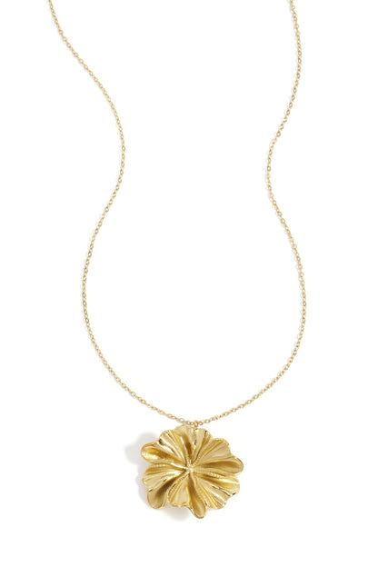 Gold flower-shaped pendant necklace with delicate chain on white background