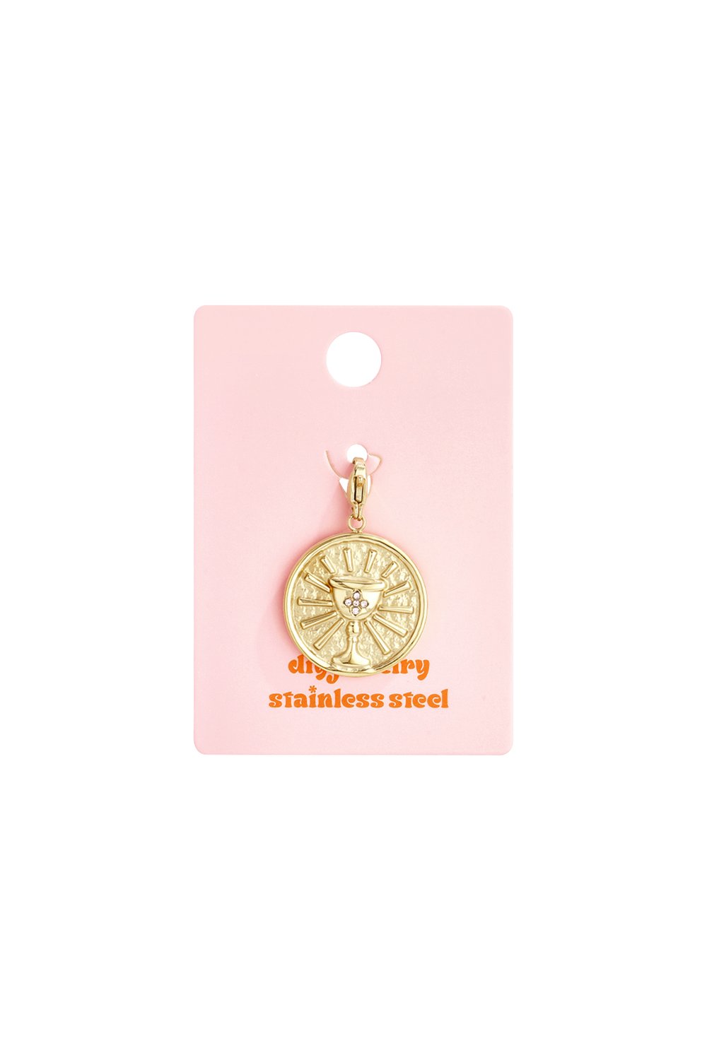 Gold-tone stainless steel coin pendant featuring an embossed chalice and small crystals, on a pink display card.