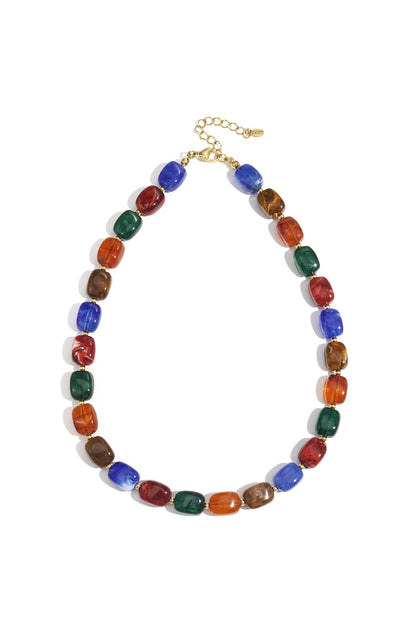 Flat lay of chunky brown marbled rectangular acrylic beaded necklace with gold-tone clasp and extender