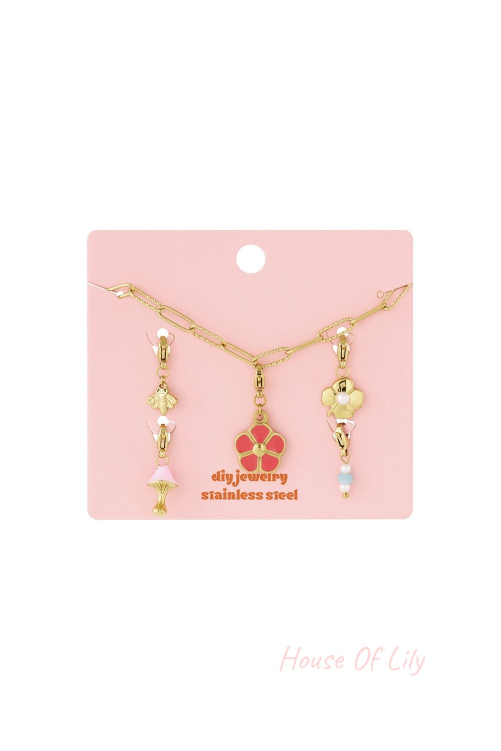 Main Character Petals: Gold-tone stainless steel chain bracelet featuring charms of a pink flower, bee, and mushroom.