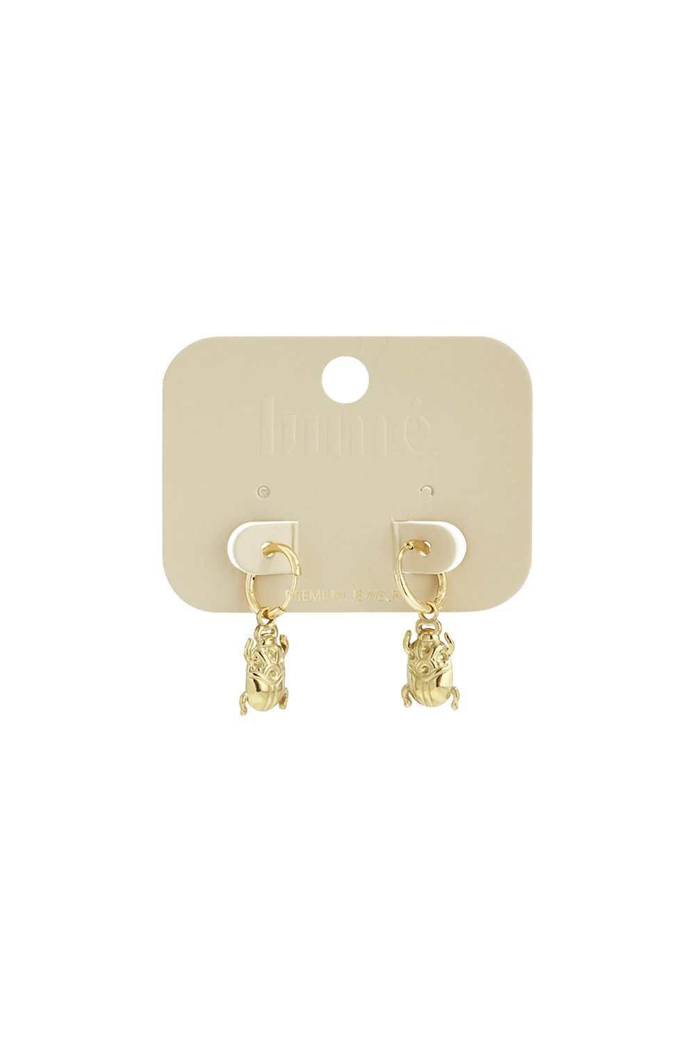 Gold hoop earrings with dangling, sculptural scarab beetle charms on a beige branded jewelry card.