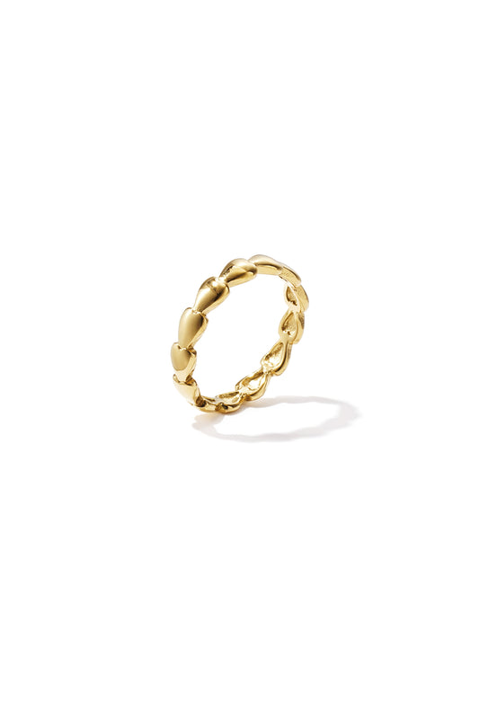 Gold ring composed of linked heart shapes isolated on white background, casting a shadow