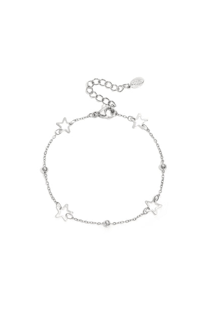 Silver star chain bracelet with hollow star charms and polished beads on white background
