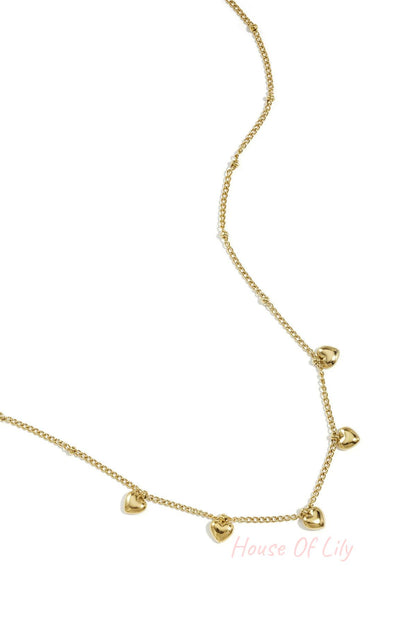 Minimalist necklace with small hearts