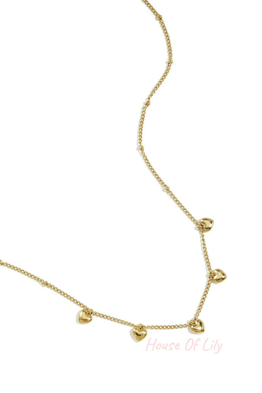 Minimalist necklace with small hearts