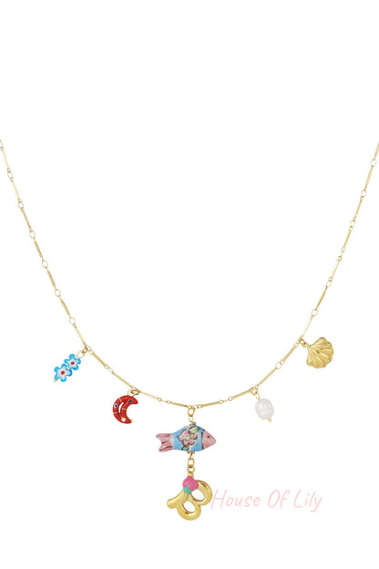 Gold charm necklace with white pearl, red cherry, pink heart, gold letter D with pink flower, blue flower, and blue chili pepper charms
