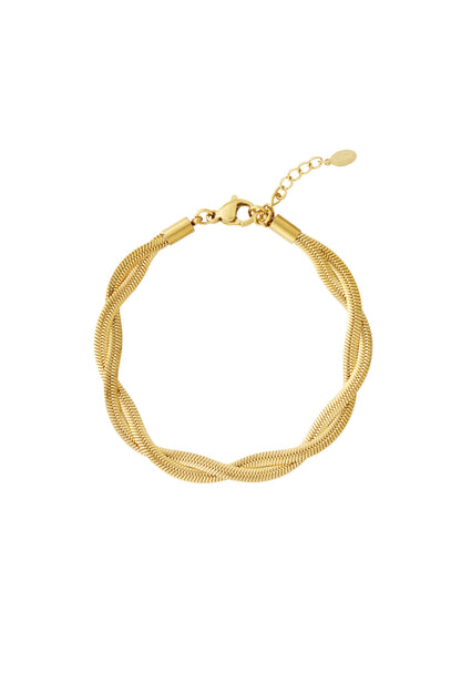 Gold twisted metal chain bracelet with lobster clasp and adjustable extension on white background