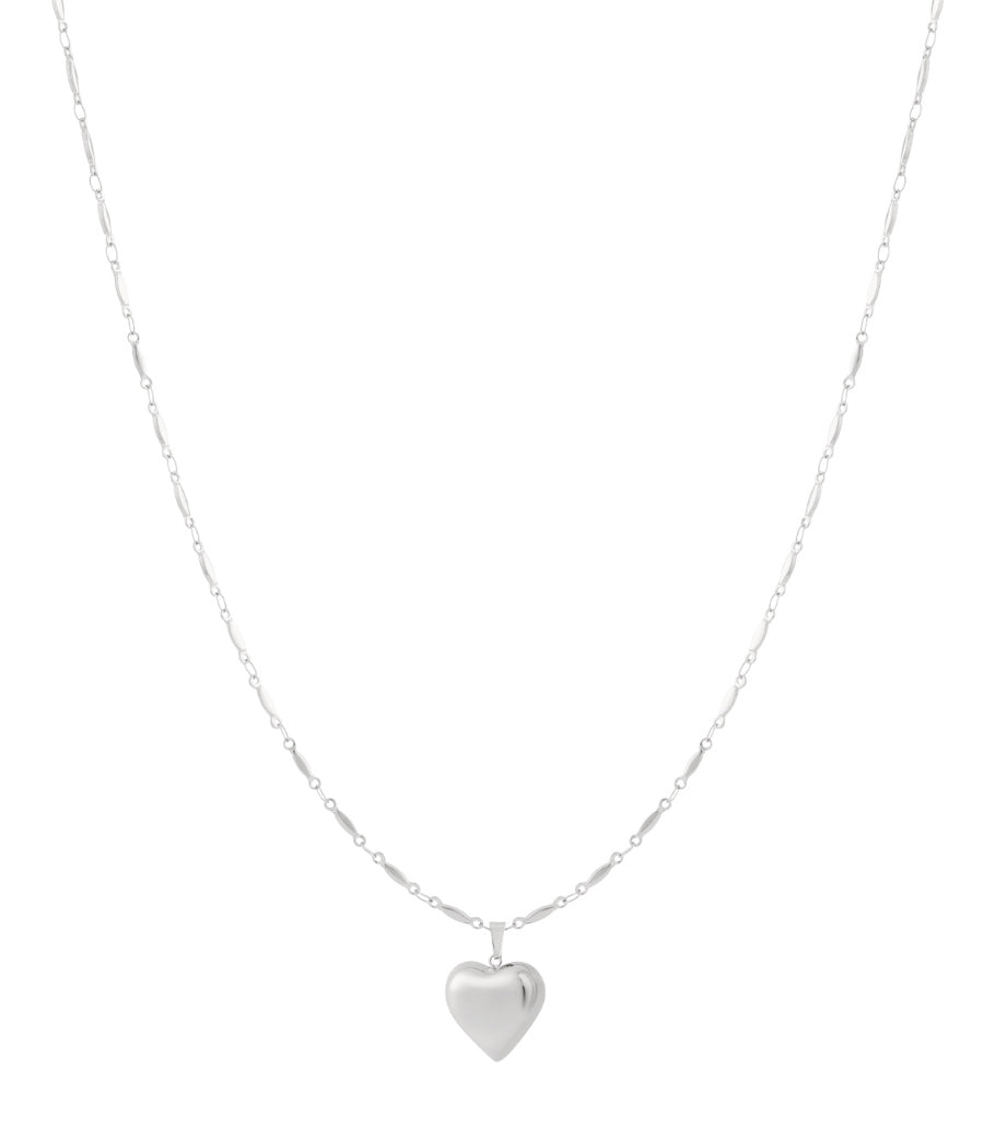 Elegant heart pendant necklace in polished silver featuring a delicate, textured chain with elongated links.