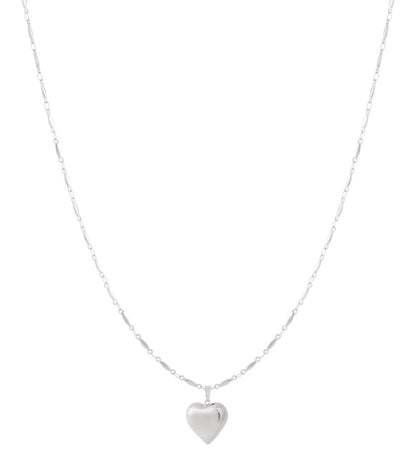 Elegant heart pendant necklace in polished silver featuring a delicate, textured chain with elongated links.