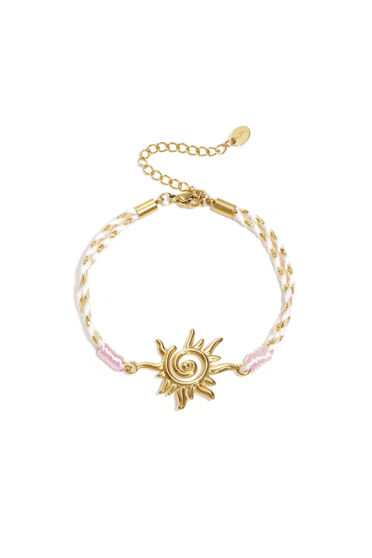 Close-up of cream and gold braided rope bracelet with gold heart charm on white background