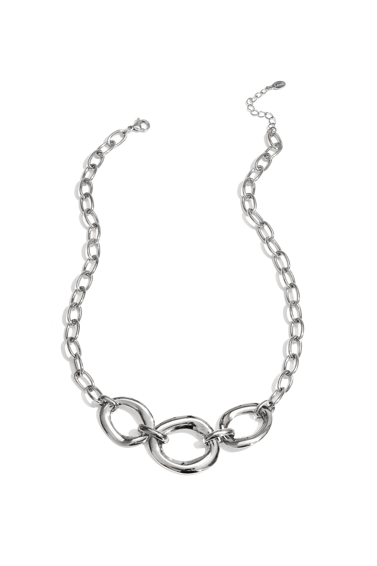 Silver chunky link necklace with three oversized rounded links and adjustable chain on white background