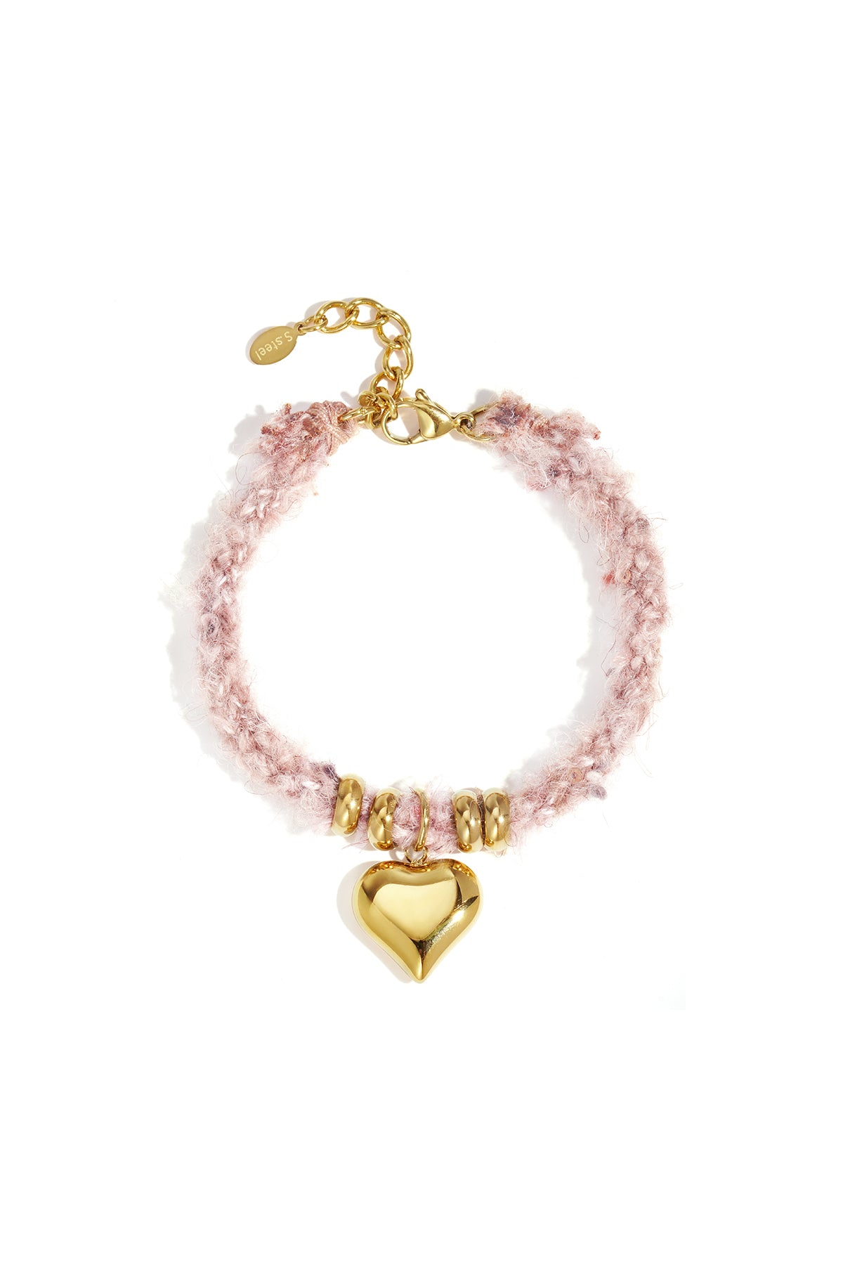 Close-up of a pink knitted bracelet with gold heart charm and gold bead accents on a white background