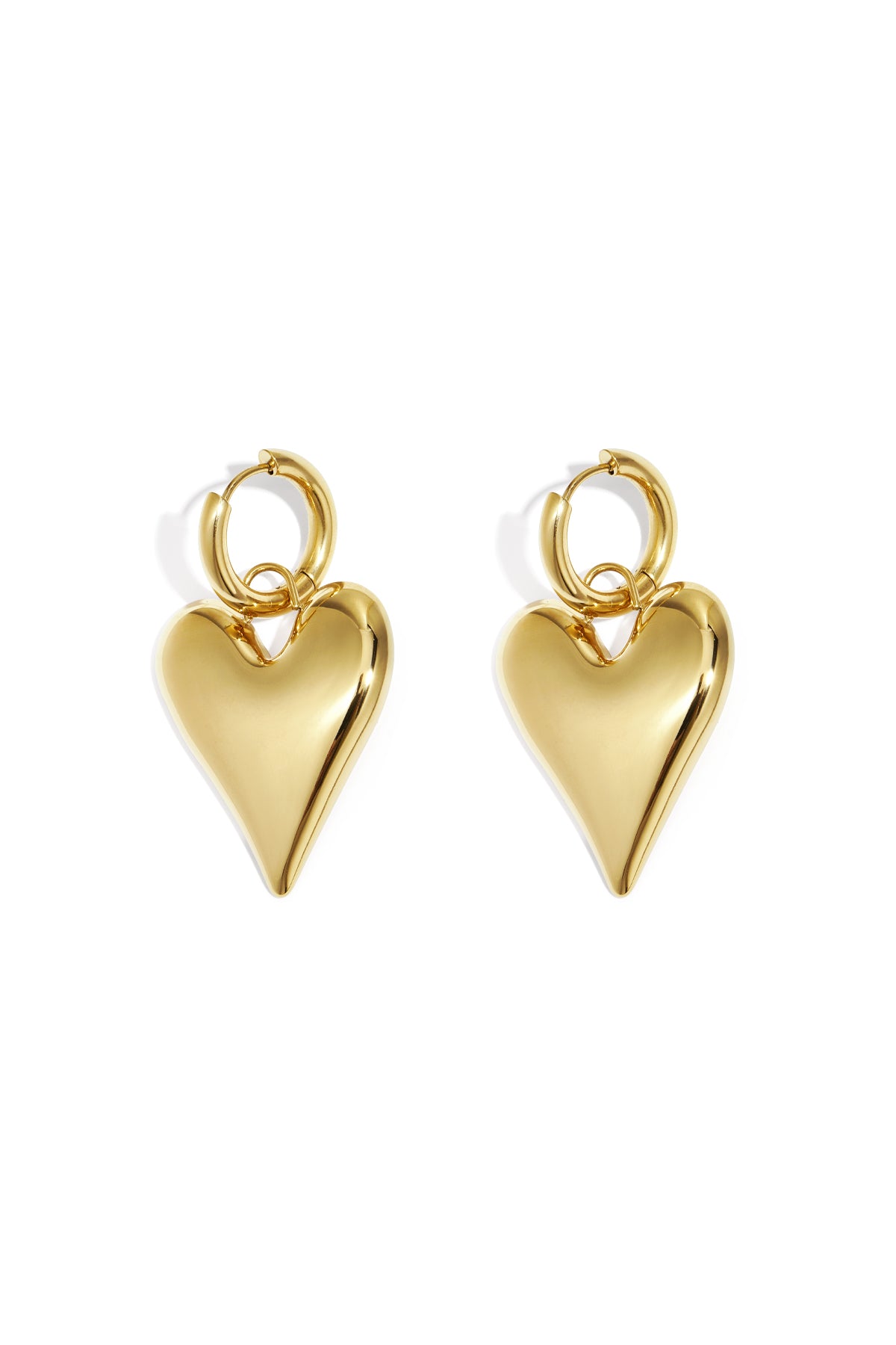 Pair of shiny gold chubby heart-shaped hoop earrings on white background