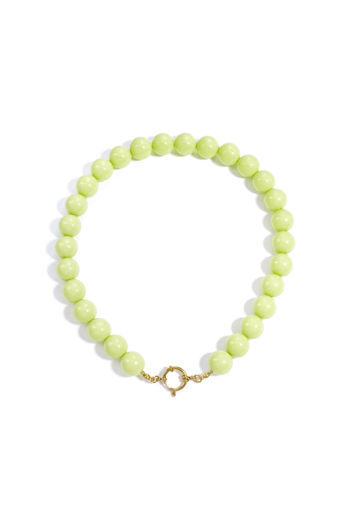 Chunky pastel yellow resin beaded necklace with gold clasp on white background