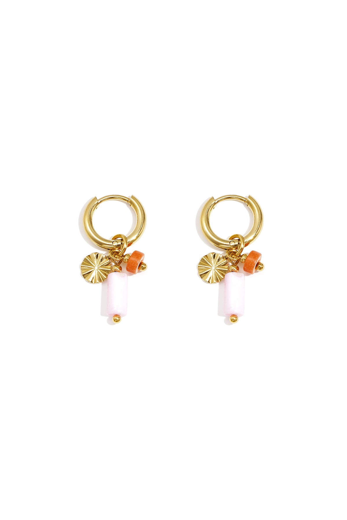 Gold-tone hoop earrings with orange and white stone beads and textured disc charm on white background
