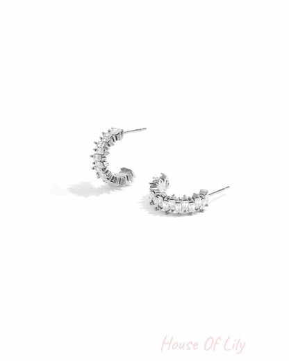 Earrings with zigzag stones