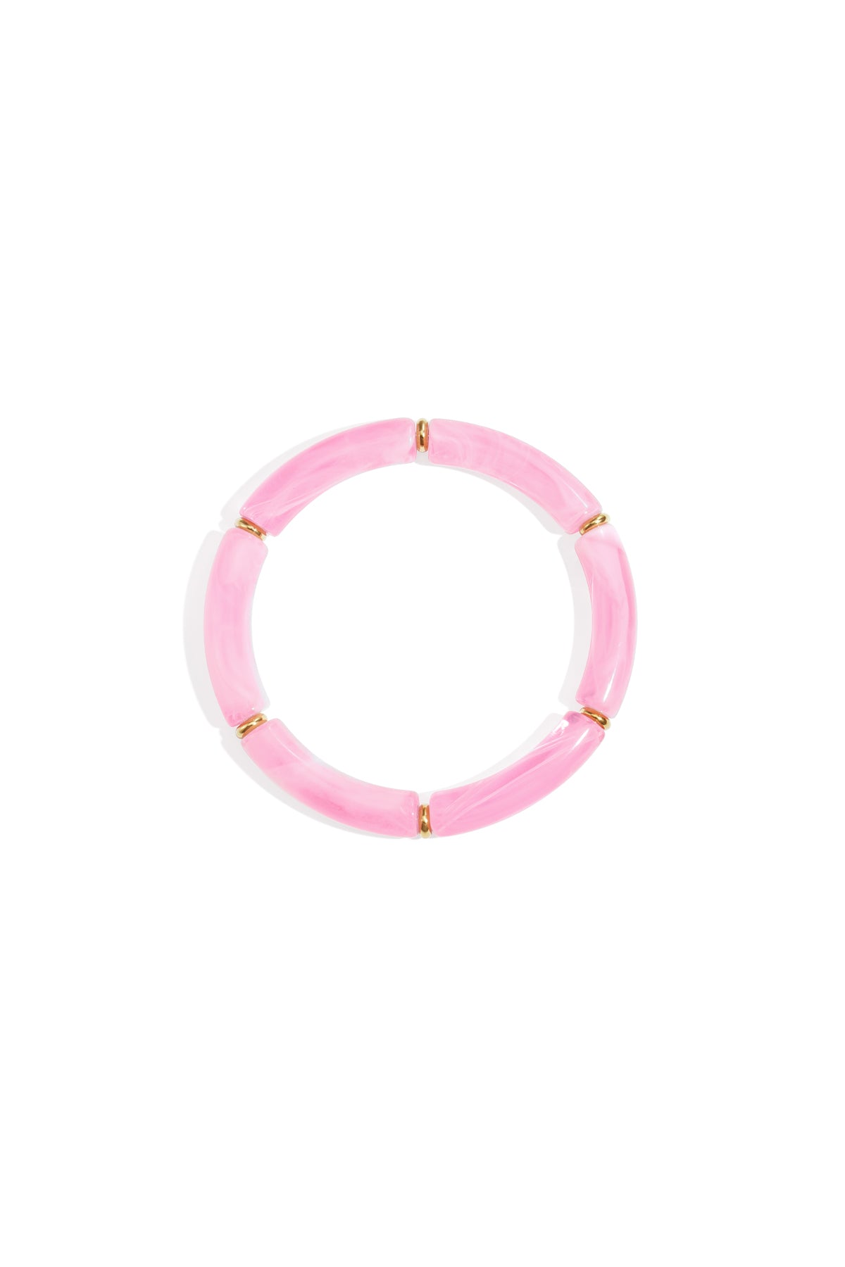 Soft baby pink resin tube bracelet with gold-tone ring spacers on white background