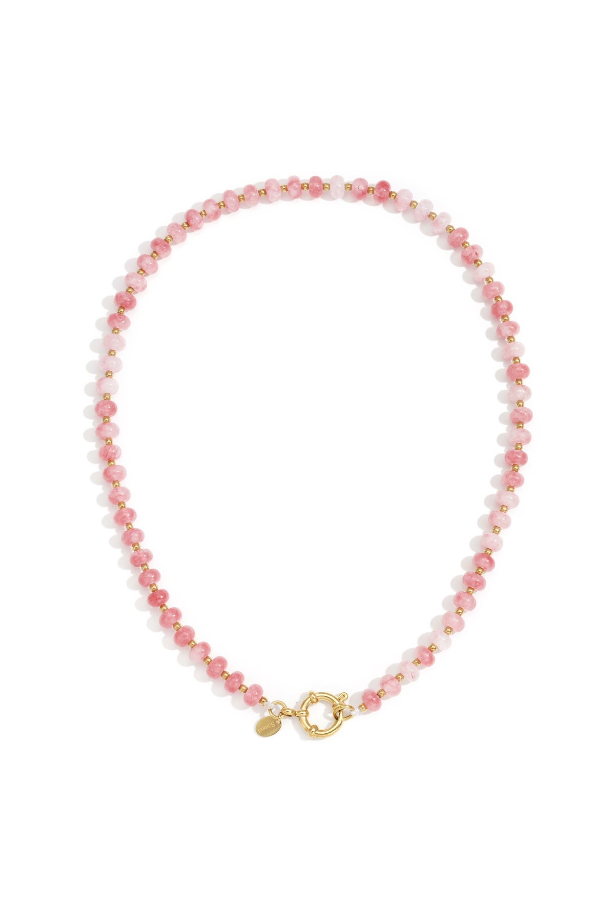 Close-up of a purple stone beaded necklace with gold beads and toggle clasp