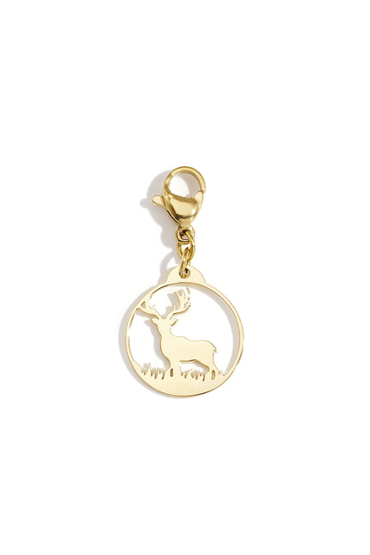 Close-up of golden reindeer charm pendant with lobster clasp isolated on white background