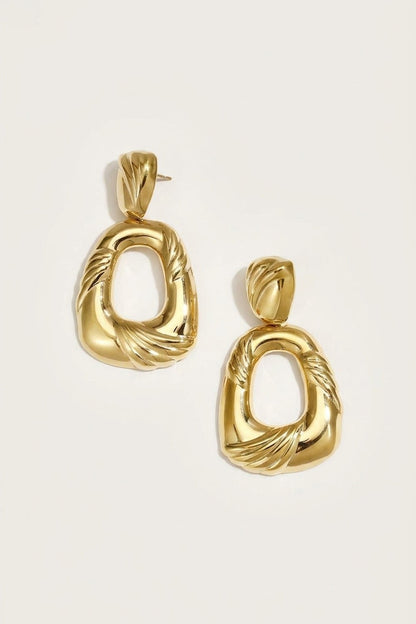 Chic Geometric Drop Earrings: Gold-toned drop earrings featuring a textured, open geometric design.