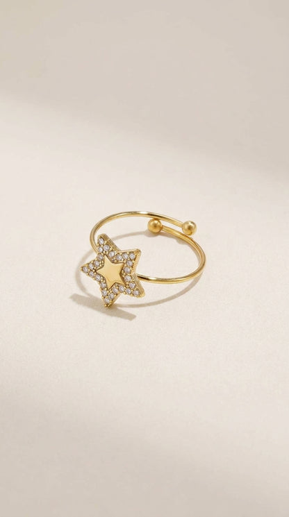 Gold Celestial Star Statement Ring with pavé-set crystals in a polished finish.