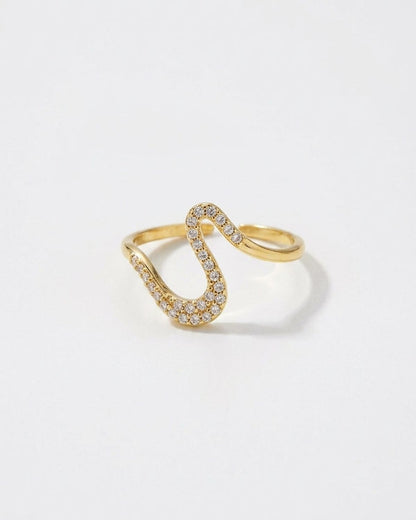 A gold Rhinestone Line Ring with an open, wavy band paved with sparkling rhinestones.