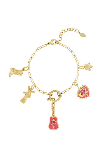 Gilded gold chain bracelet featuring eclectic charms including a guitar, windmill, cowboy boot, flower, and evil eye.