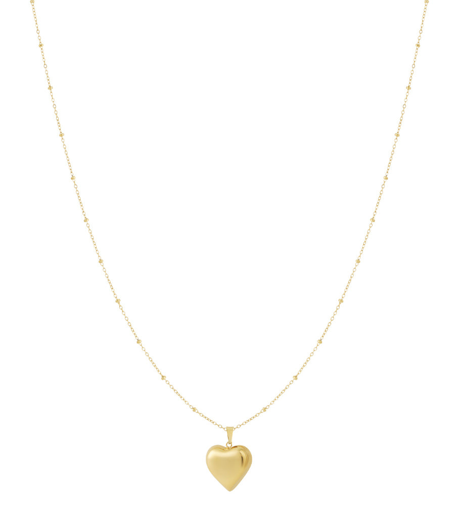 Golden heart pendant necklace with a delicate beaded chain on white background