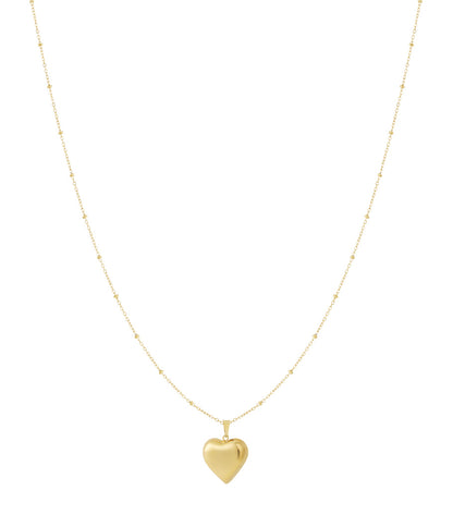 Golden heart pendant necklace with a delicate beaded chain on white background