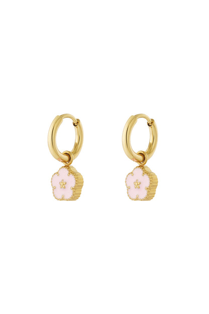 Gold-tone hoop earrings with pastel pink enamel flower charms on white background