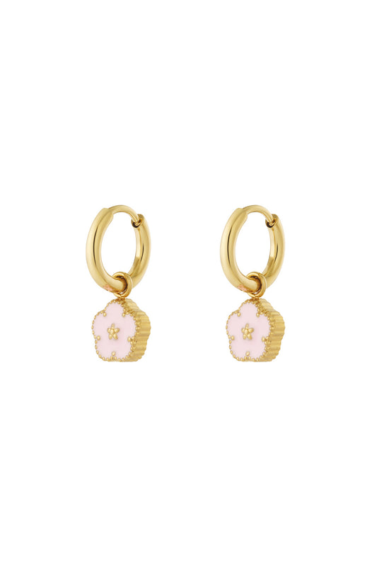 Gold-tone hoop earrings with pastel pink enamel flower charms on white background