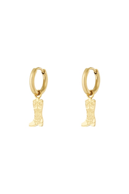 Pair of gold hoop earrings with hanging cowboy boot charms featuring floral detail on white background