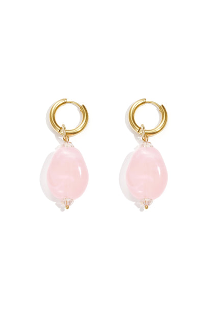Pair of gold hoop earrings with pale pink cloudy resin beads