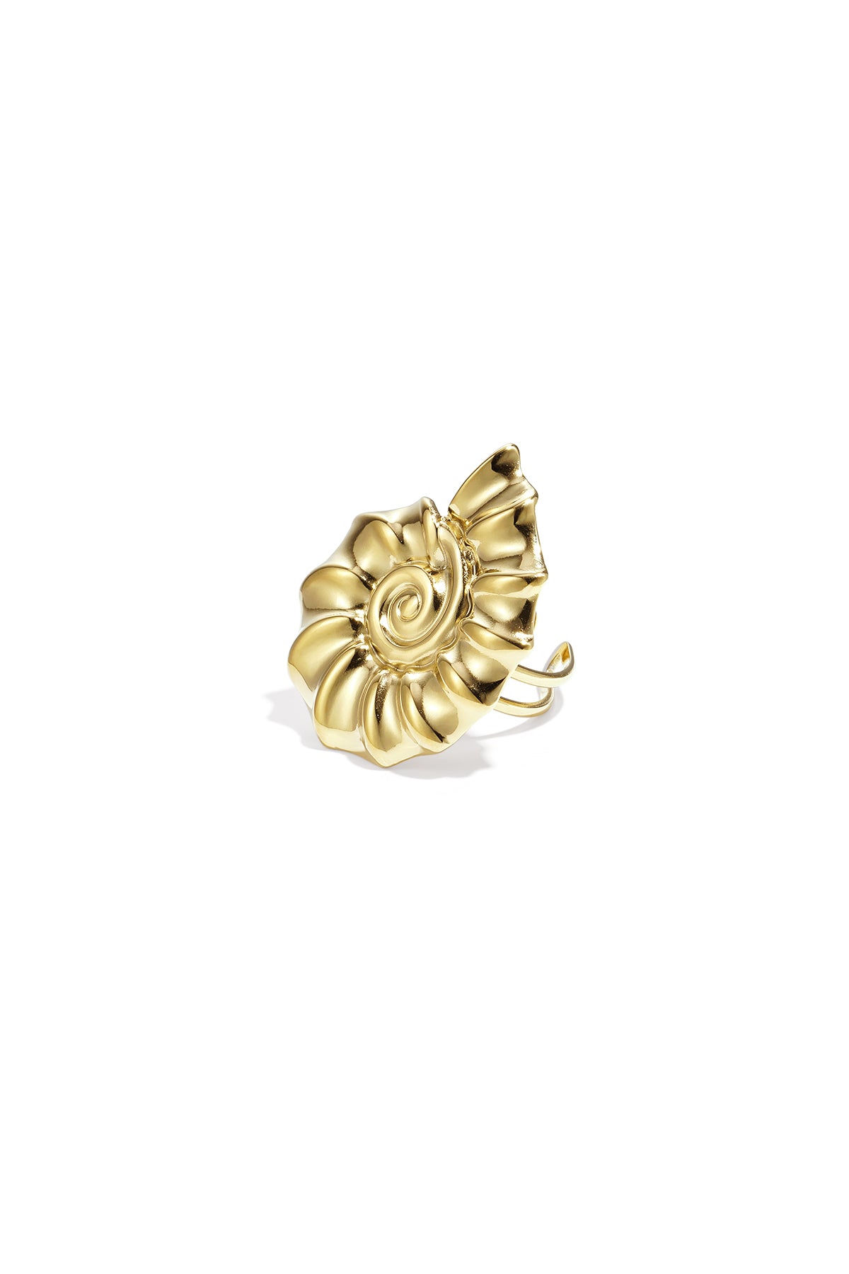 Close-up of gold spiral shell shaped statement ring on white background