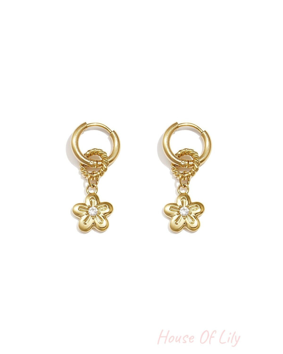 Earrings with a dangling daisy