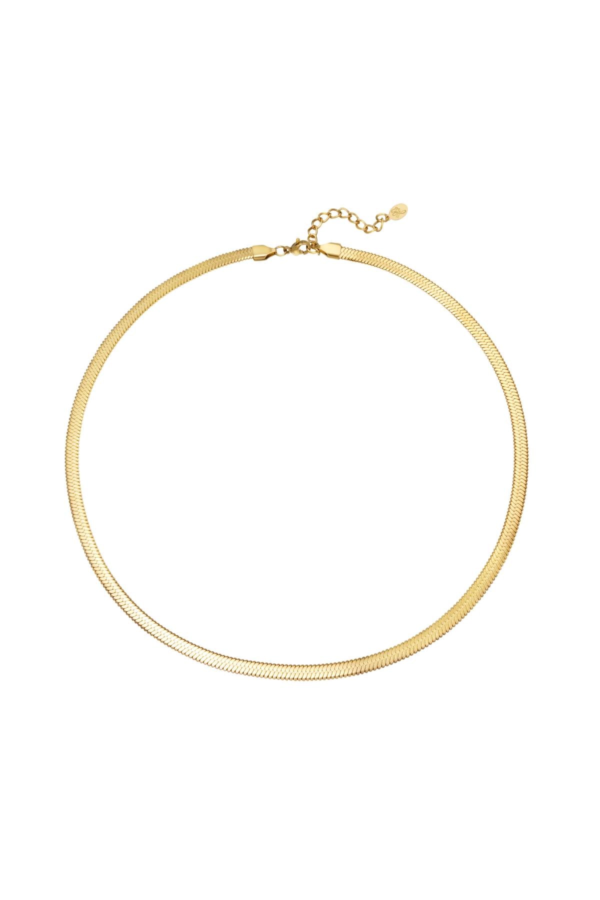 Close-up of gold minimalist chain necklace with smooth flat links on white background