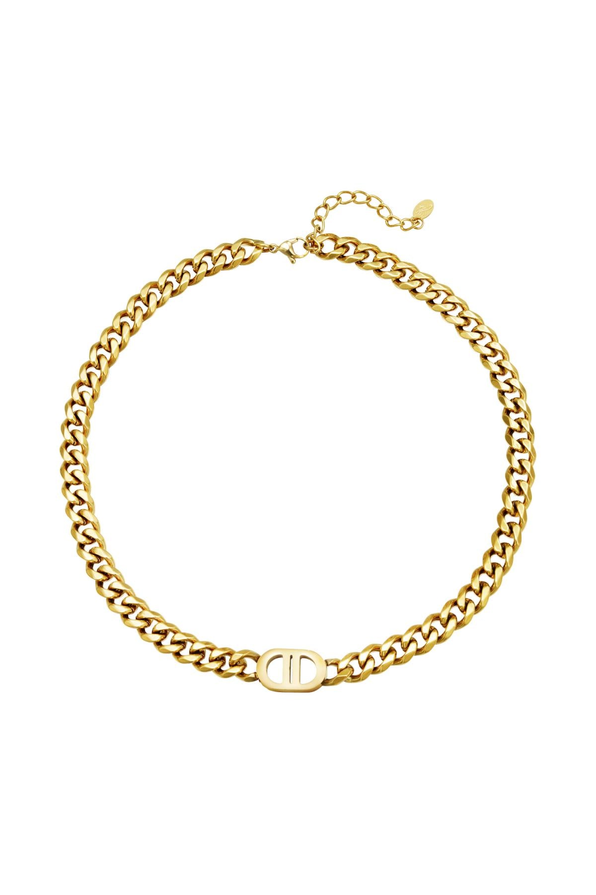 Gold-tone chunky chain necklace with oval logo charm laid flat on white background