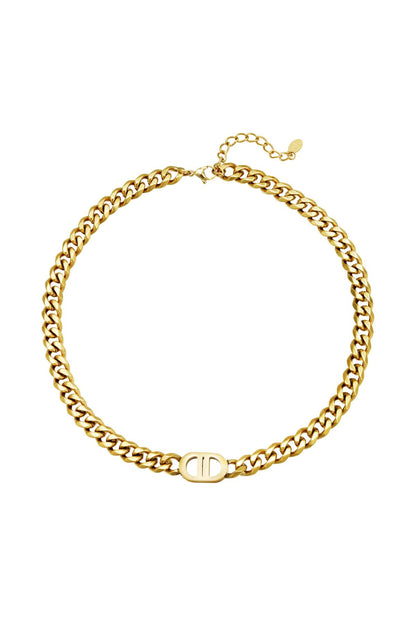 Gold-tone chunky chain necklace with oval logo charm laid flat on white background