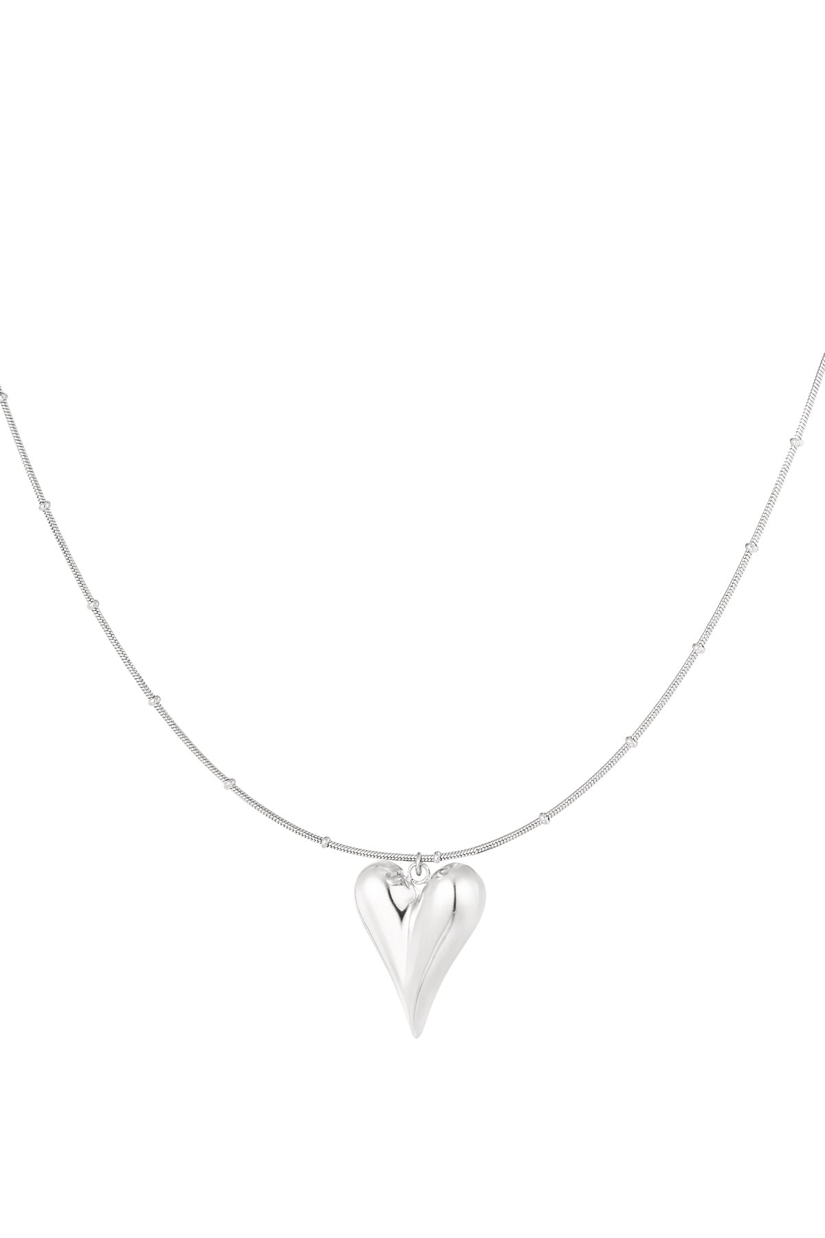 Silver chunky heart pendant necklace with bead-accented chain on white background