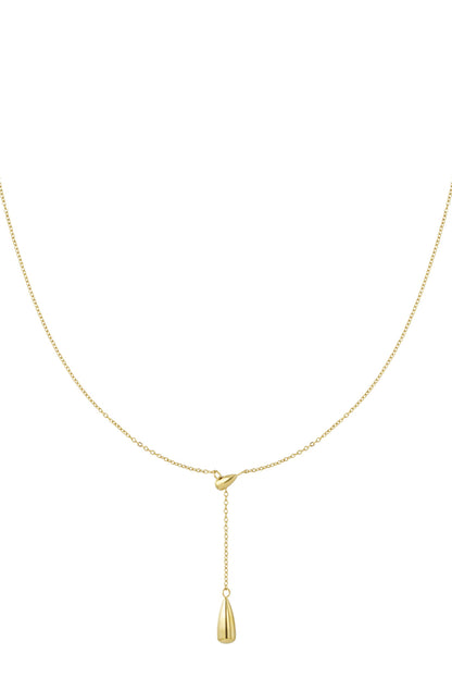 Minimalist gold drop charm necklace with fine chain against white background