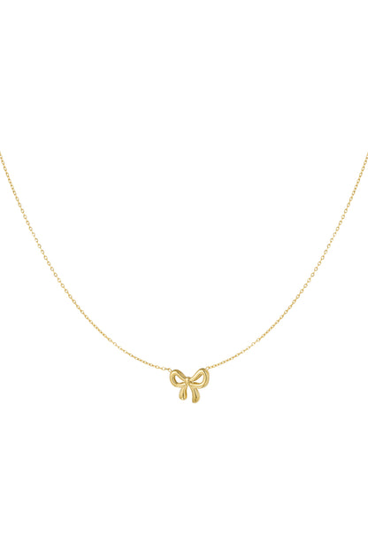 Delicate gold bow pendant necklace on a fine chain displayed on white background