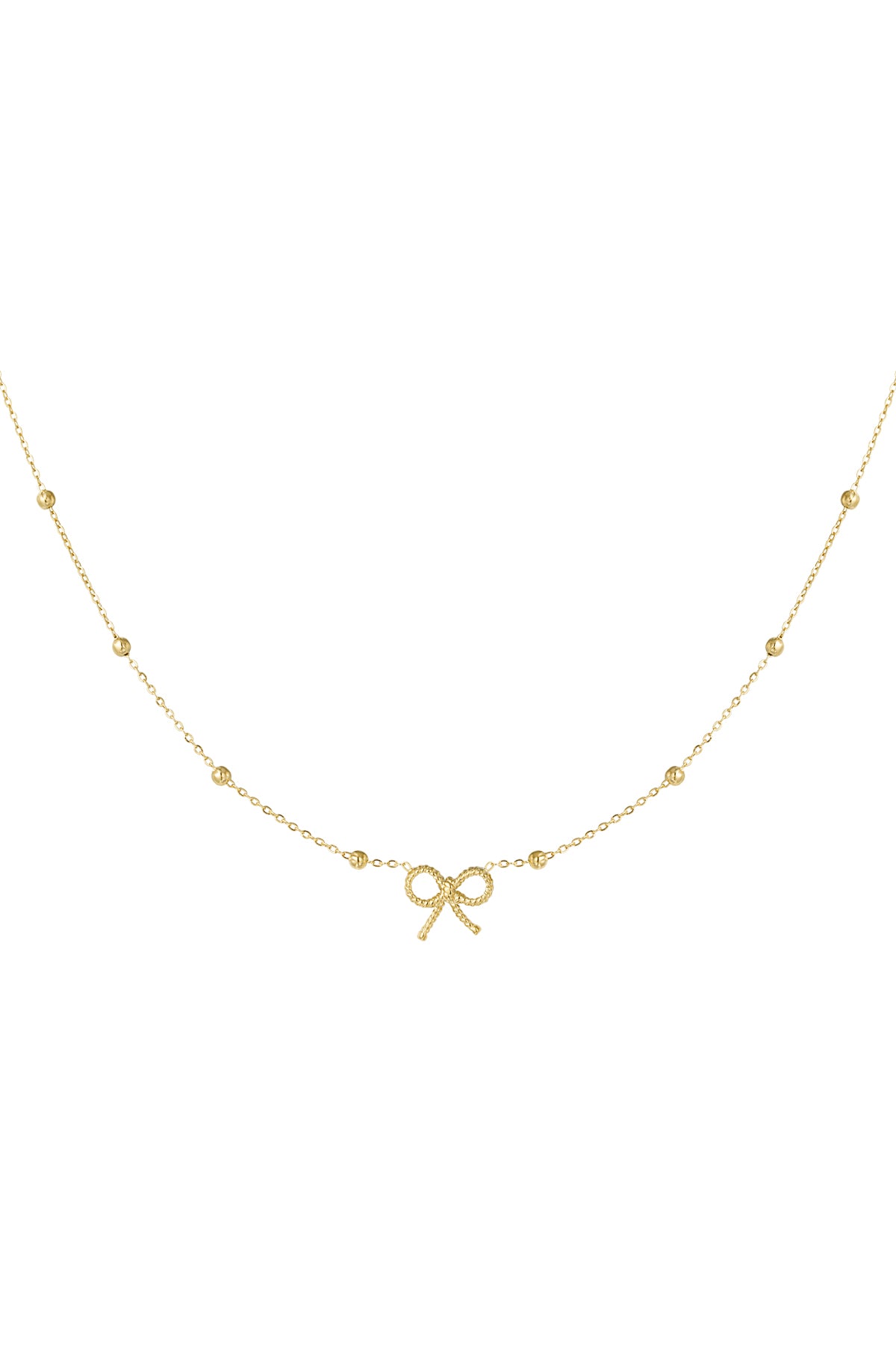 Close-up of a delicate gold bow pendant necklace featuring a fine chain with small evenly spaced beads