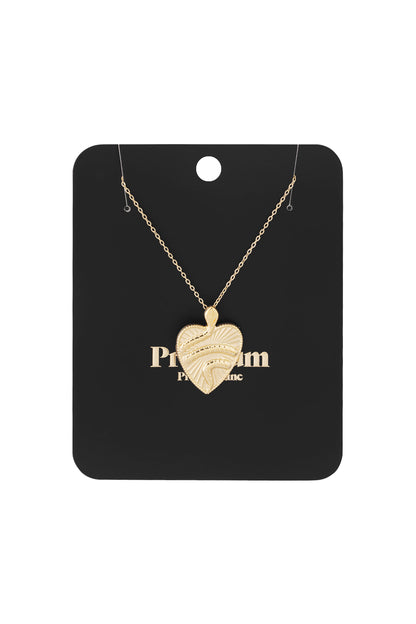 Gold textured heart pendant necklace displayed on black card packaging labelled Premium