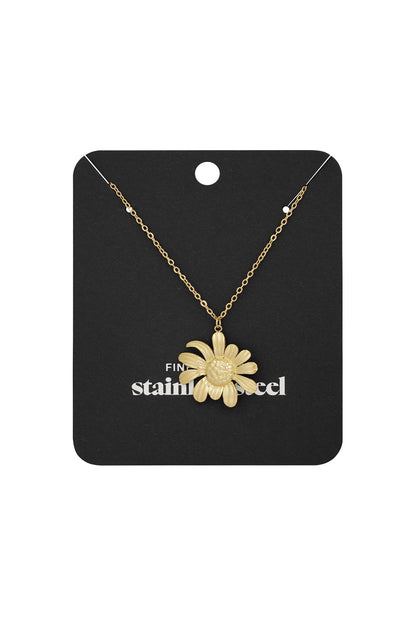 Golden daisy pendant necklace displayed on black branded packaging card highlighting fine stainless steel craftsmanship