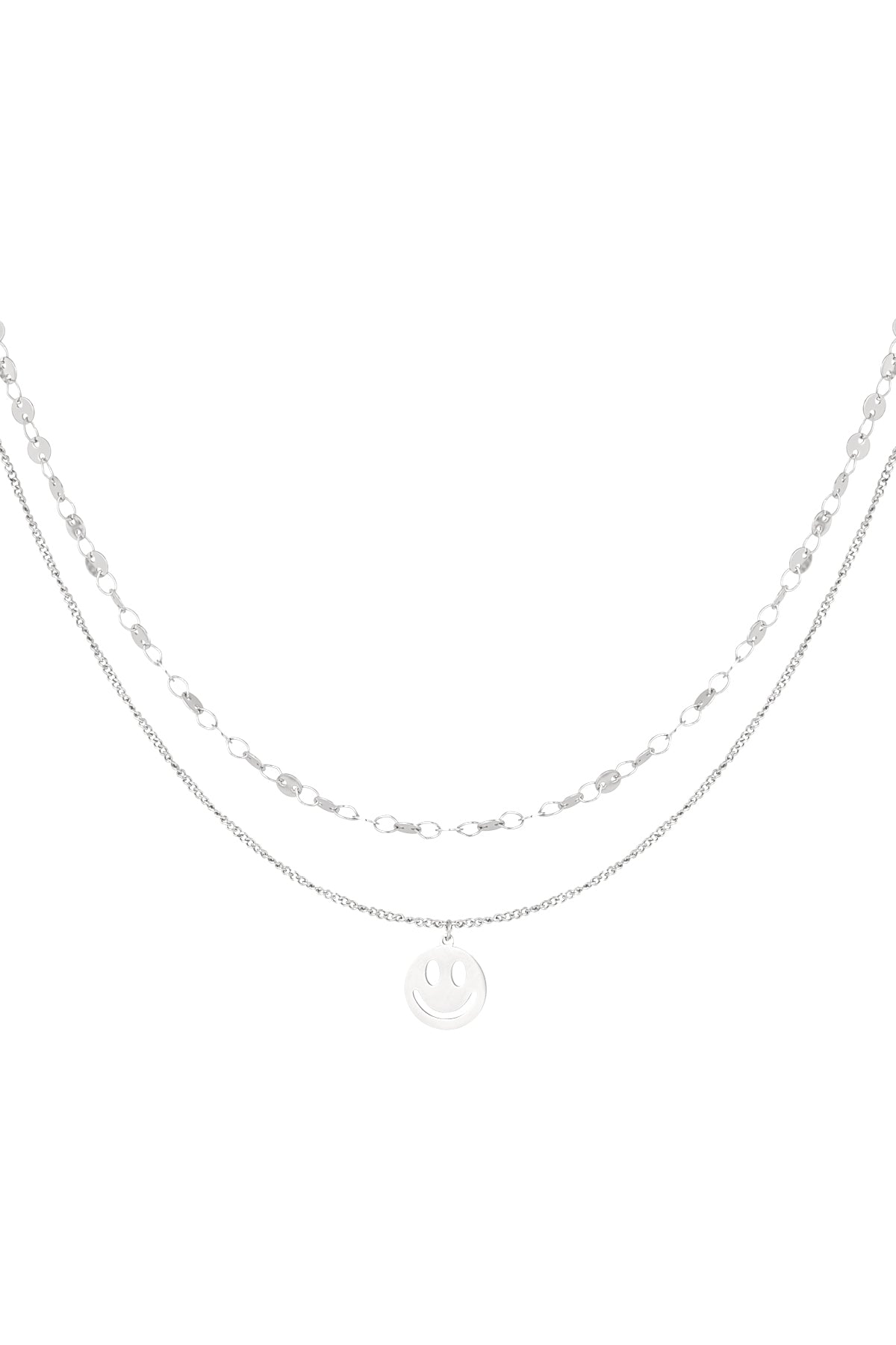 Silver layered necklace with smiley face pendant isolated on white background