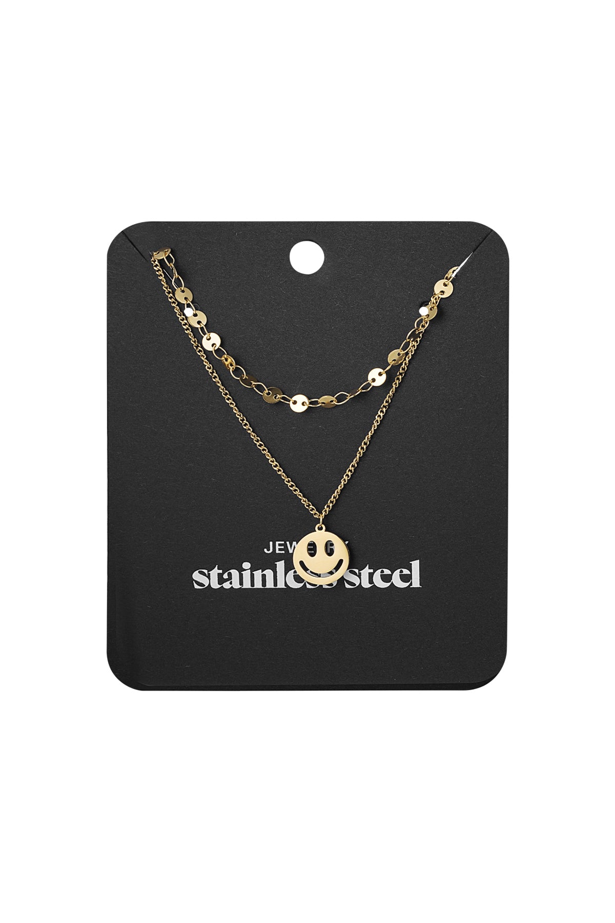 Gold layered smiley face necklace displayed on black jewelry card with stainless steel label