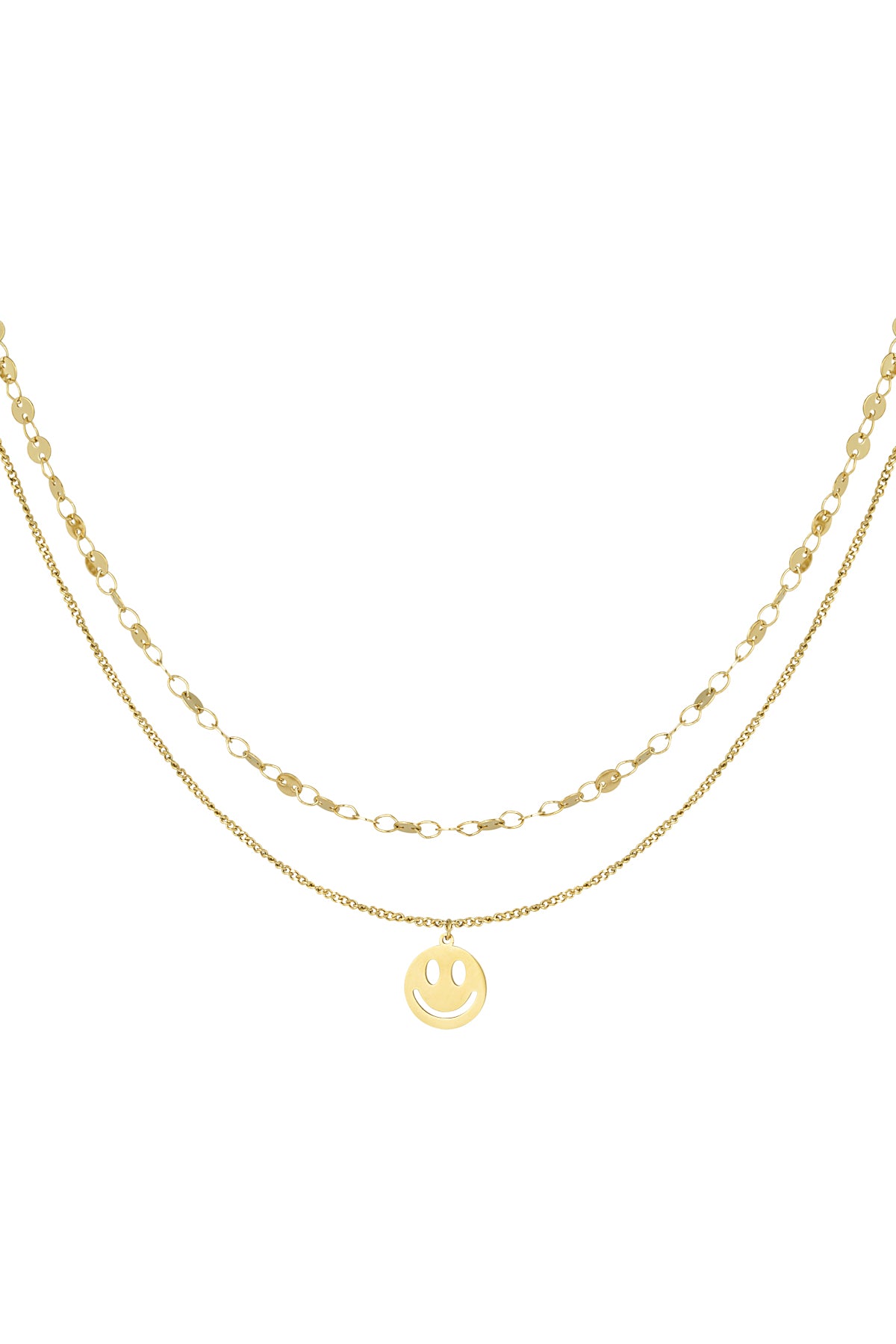 Gold layered necklace with smiley face pendant isolated on white background