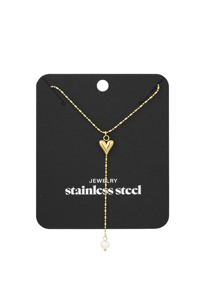 Jewellery display card showing gold-tone heart pendant necklace with pearl drop and stainless steel label
