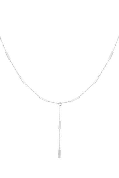 Silver-tone chain necklace with rectangular bar pendants and a drop pendant detail on a white background
